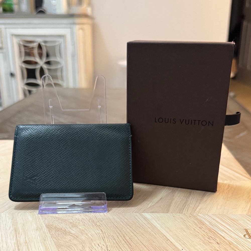 Louis Vuitton Enveloppe Cartes de Visite card holder in dark green Taiga leather